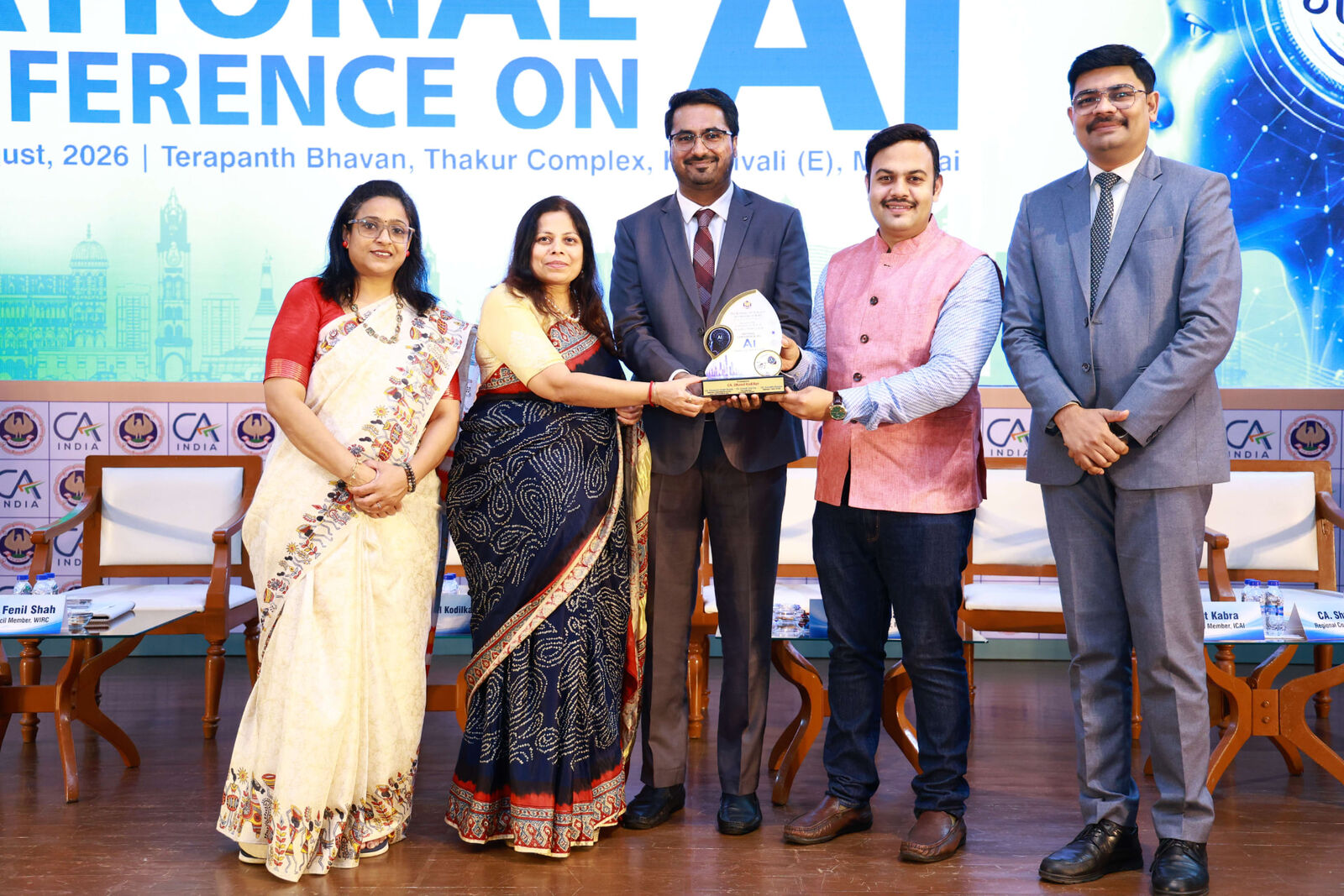 CA Dhaval Kodilkar felicitated on stage at the National Conference on AI, Mumbai