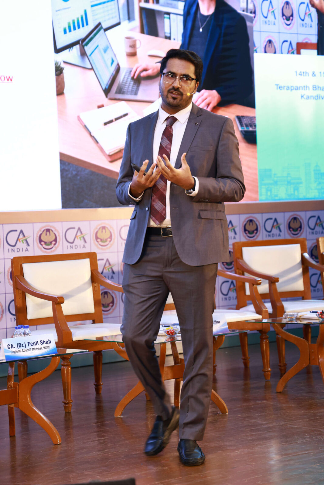 CA Dhaval Kodilkar on stage at the National Conference on AI, Mumbai