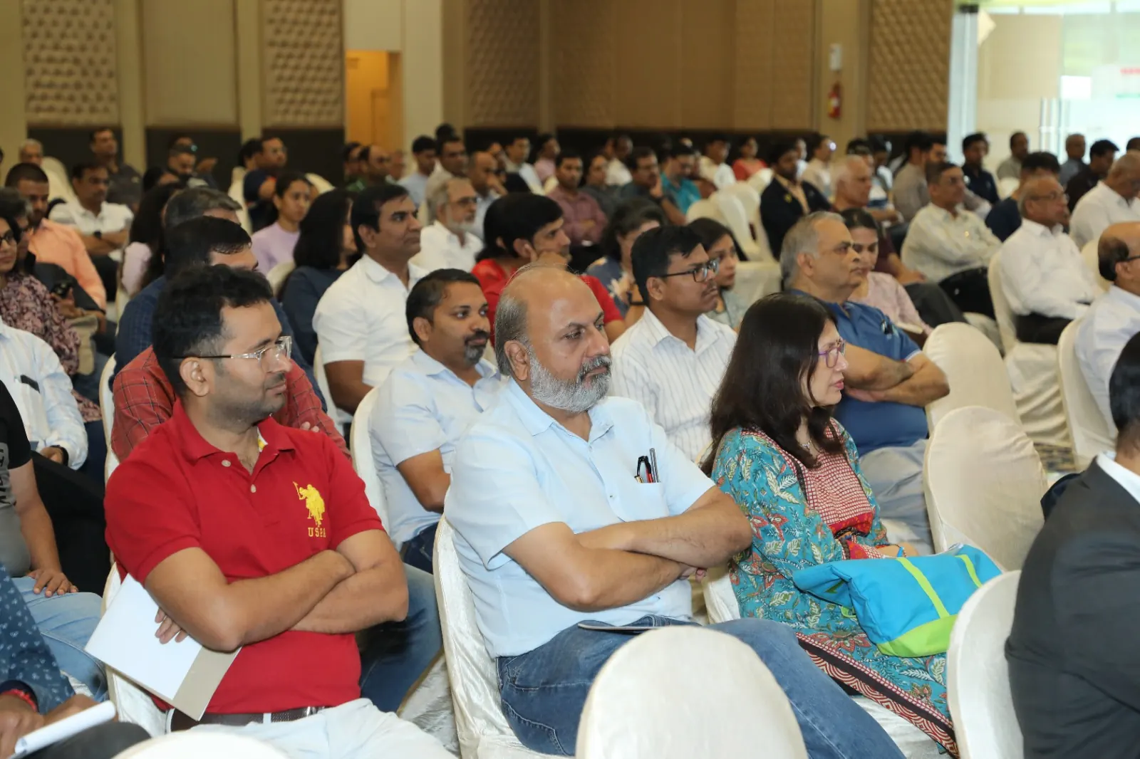 Chartered accountants listening to an AI session in Pune