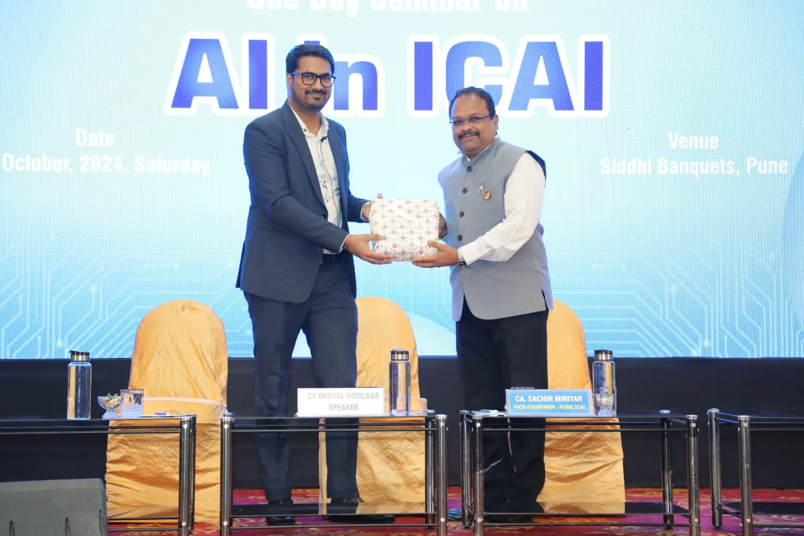 CA Dhaval Kodilkar felicitated on stage at the AI in ICAI seminar in Pune