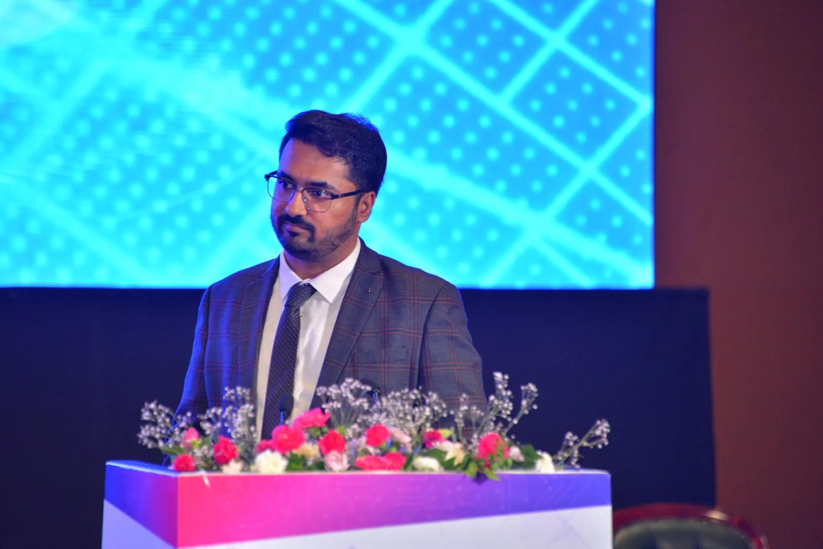 CA Dhaval Kodilkar addressing the ICAI AI Innovation Summit 2026 from the podium