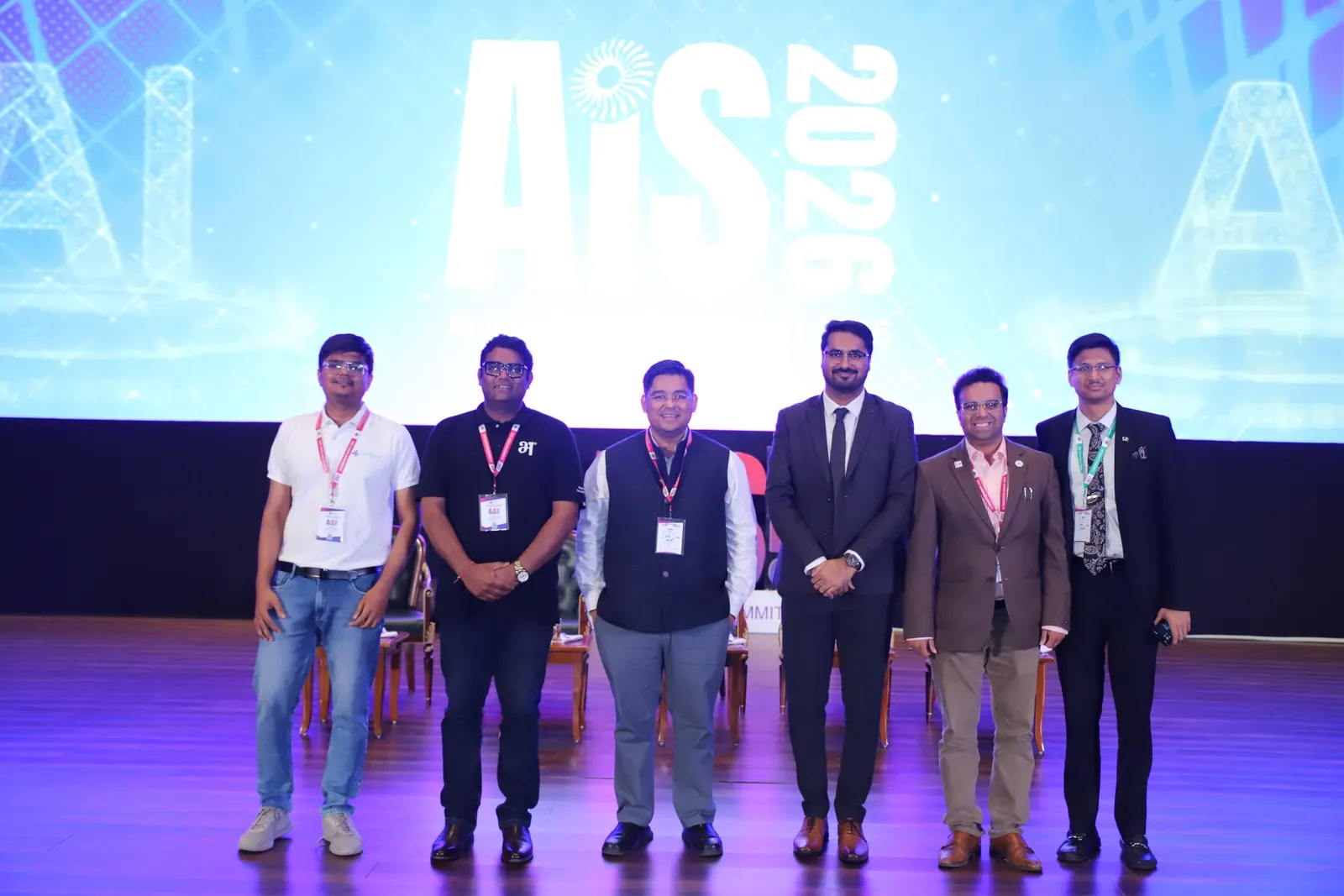 Panel speakers including CA Dhaval Kodilkar on stage at AIS 2026, New Delhi