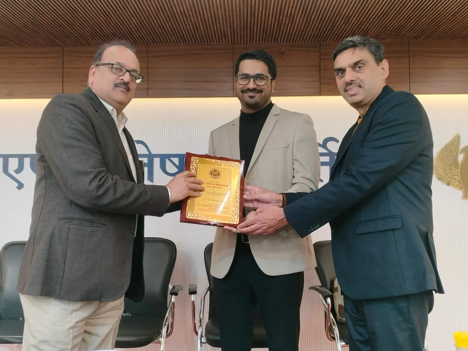 CA Dhaval Kodilkar receiving a memento from the ICAI Chandigarh Branch