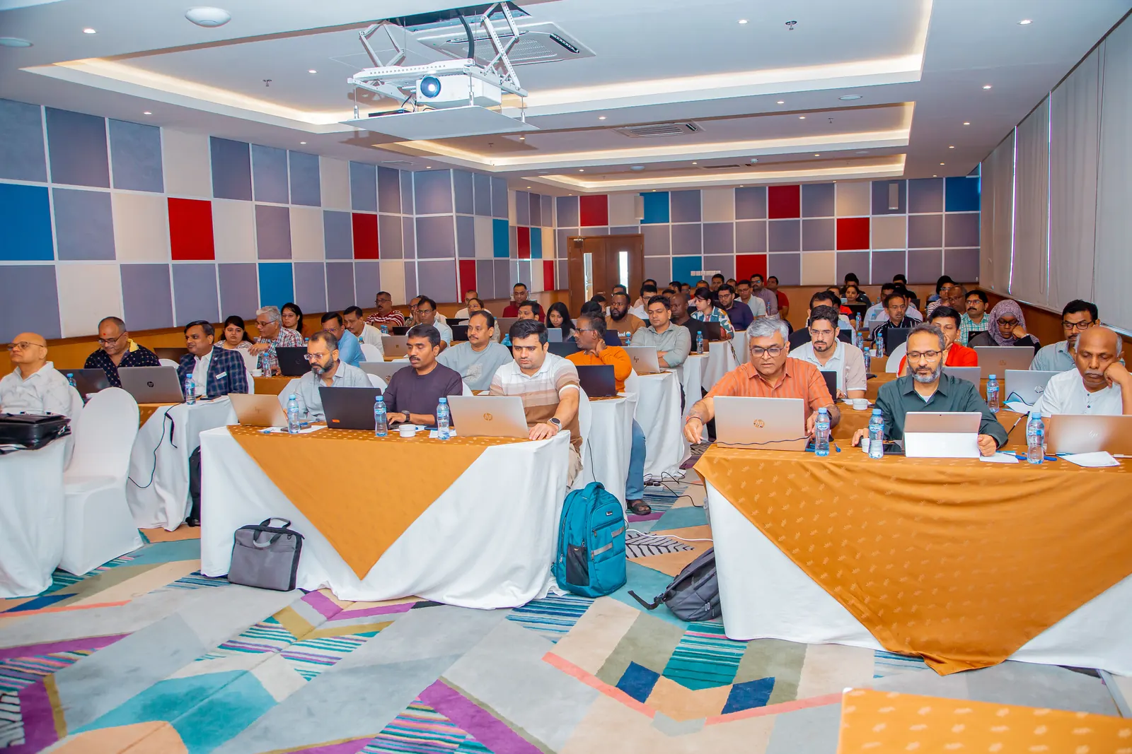 Participants with laptops at the AI session for the ICAI Dar es Salaam chapter, Tanzania