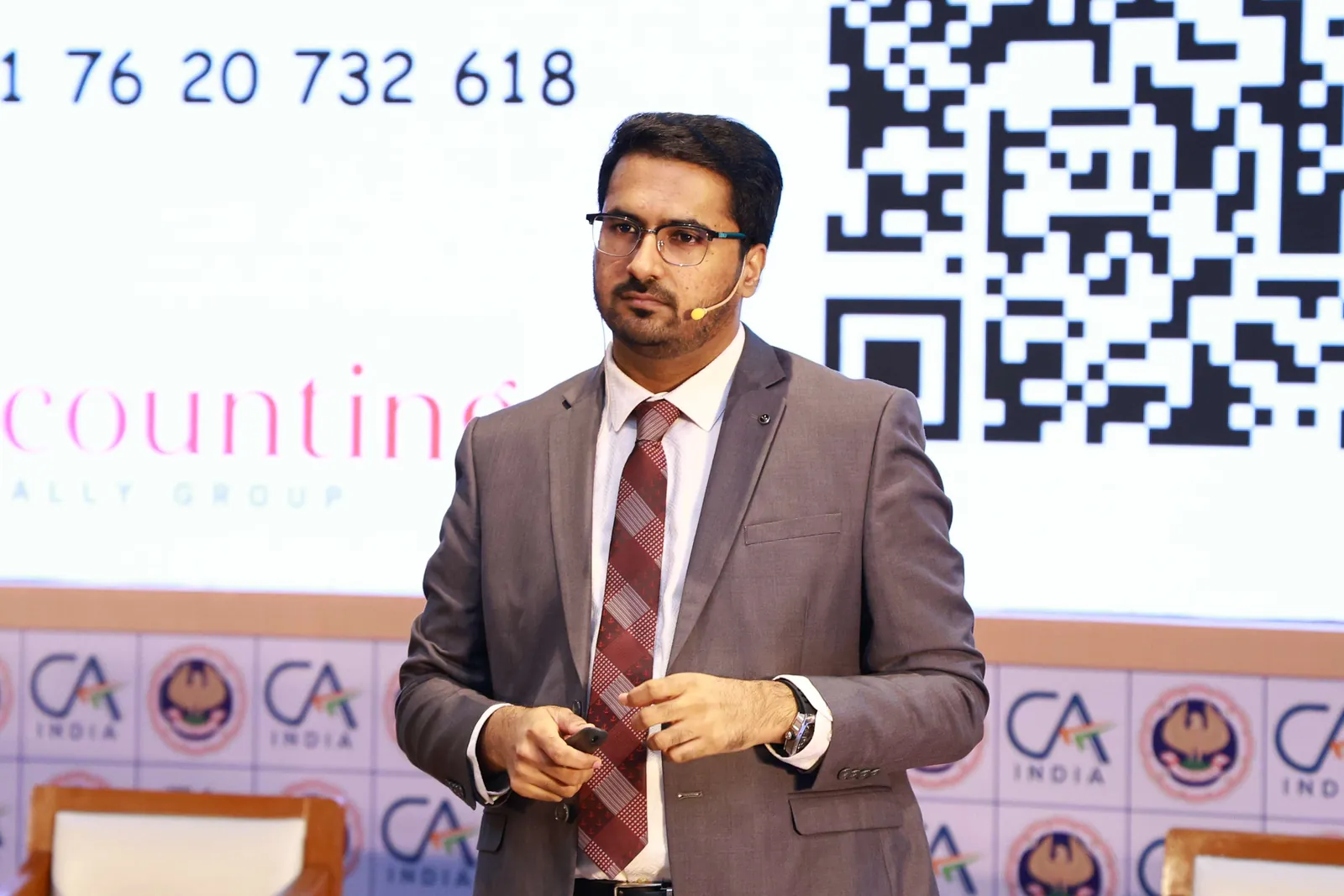 CA Dhaval Kodilkar speaking about AI adoption at the National Conference on AI in Mumbai